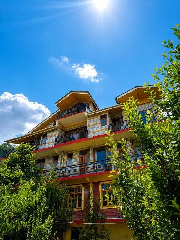 Ghar in the Hills surrounded by apple orchards and pine
