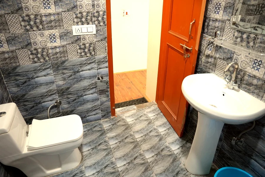 Bathroom with mosaic tiles at Ghar in the Hills