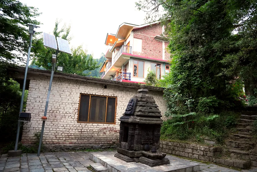Ghar in the Hills property exterior surrounded by greenery